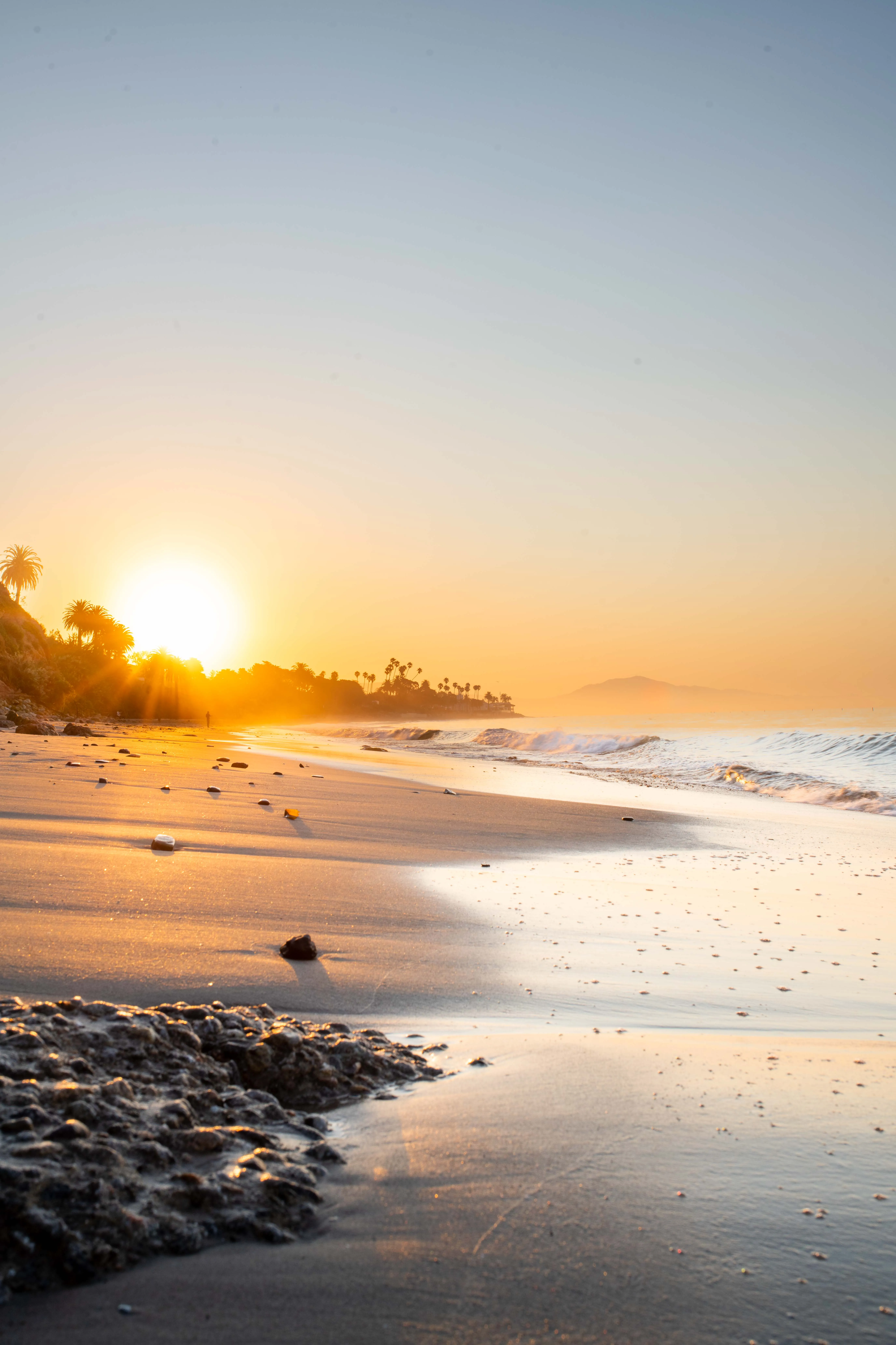 Golden hour coastal landscape photography by Thomas McClure in Santa Barbara California featuring cliffs and sandy beach