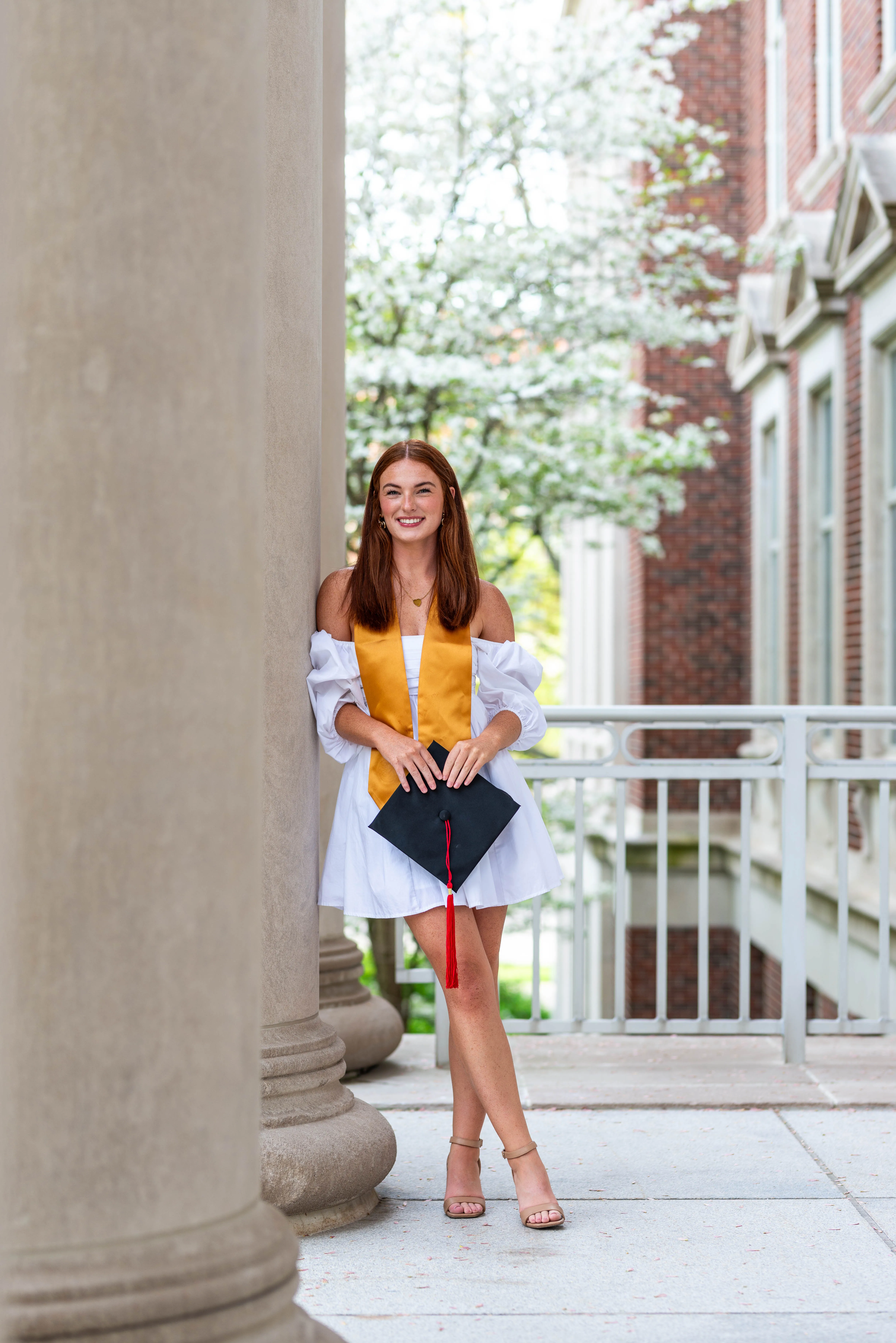 Environmental portrait photography by Thomas McClure of a graduate student standing confidently at Purdue University