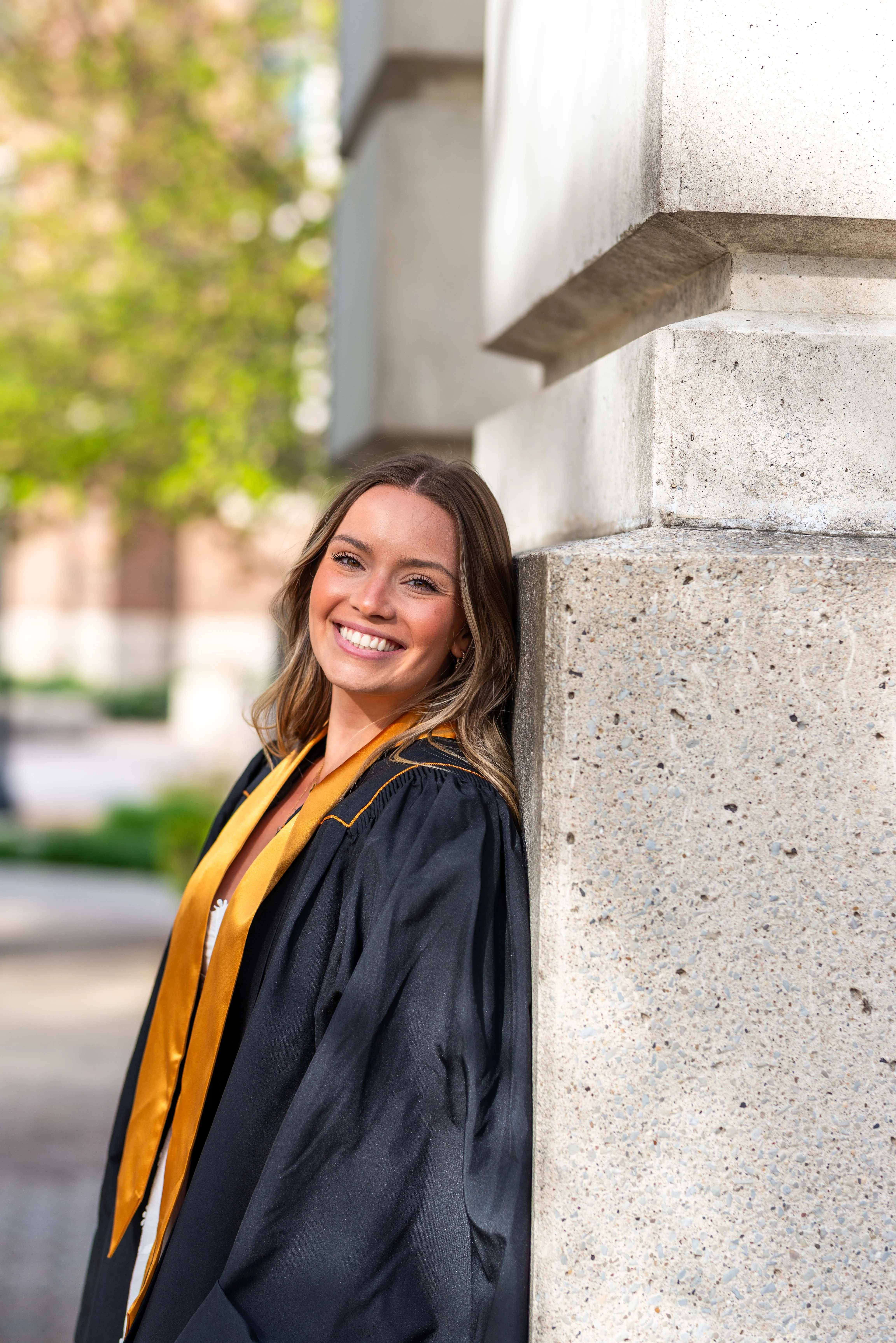 Black and white group portrait photography by Thomas McClure of graduates looking at camera in West Lafayette Indiana